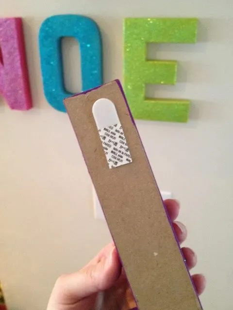 Command strip to hang cardboard letters