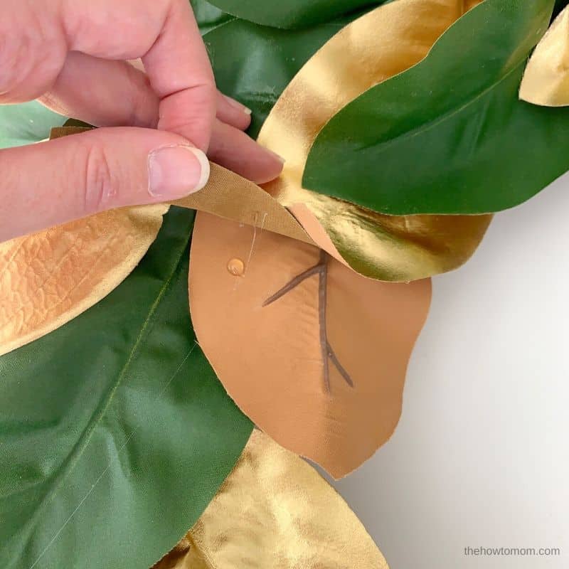gold and green magnolia wreath