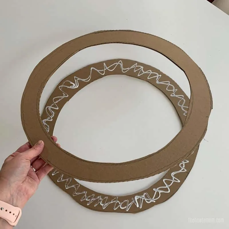 glue cardboard together to make a wreath