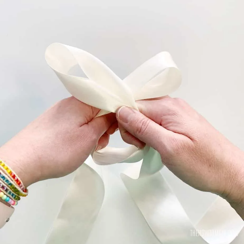 how to tie a bow with satin ribbon